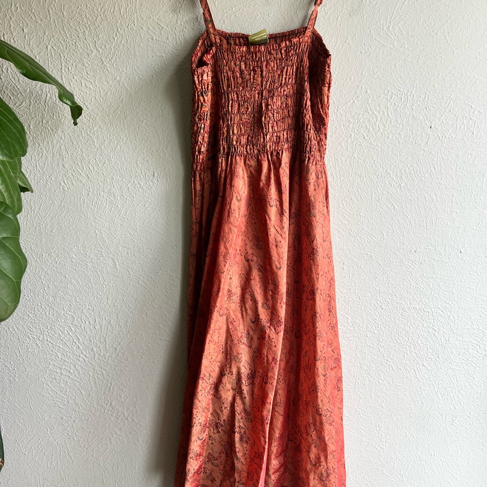 Urban Norma’s silk  Coral Smocked Maxi Dress